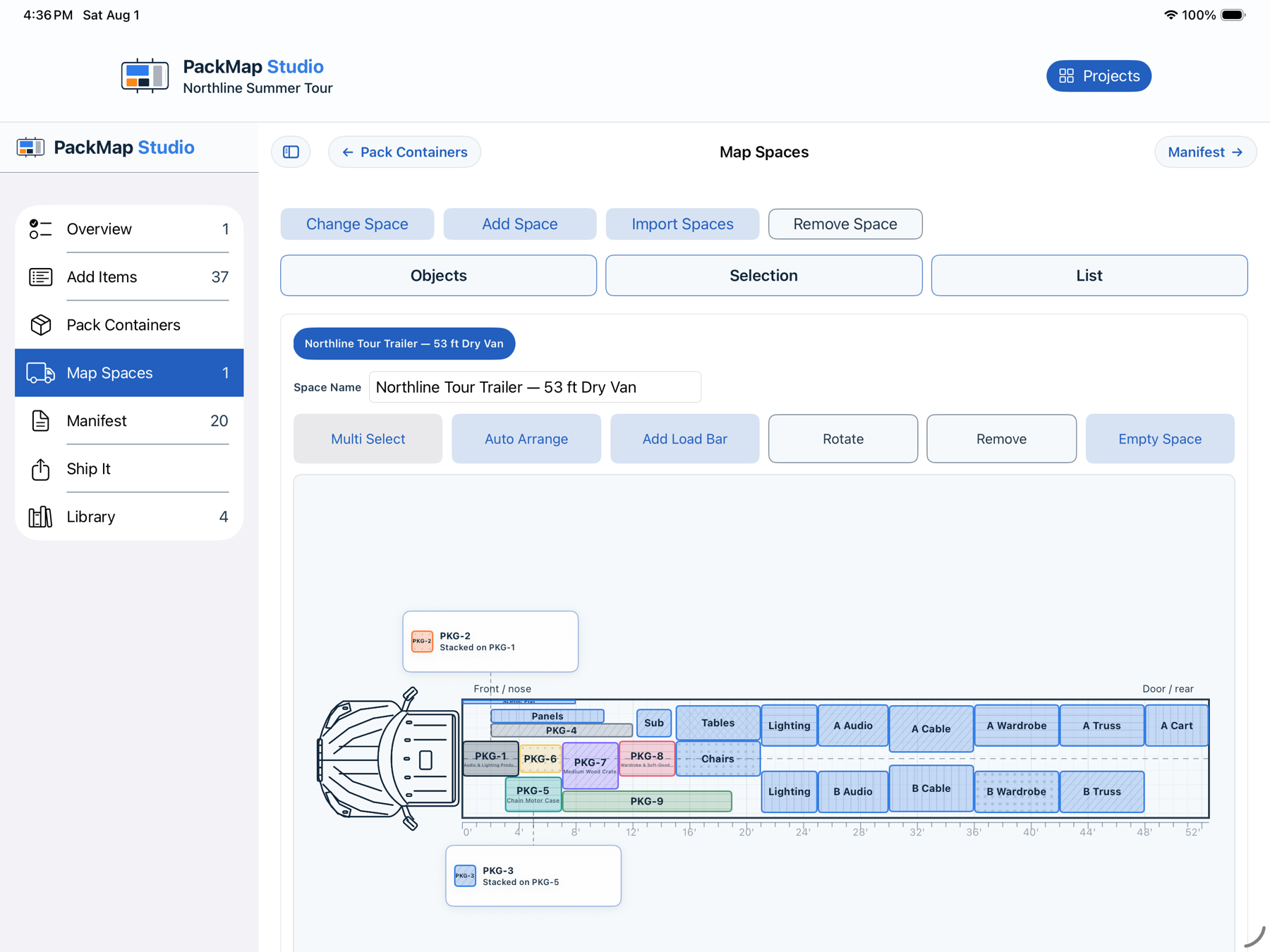 PackMap Studio Map Spaces screenshot showing a nearly full Northline tour trailer with labeled audio, lighting, cable, wardrobe, truss, cart, and production loads plus two stacked-package callouts.